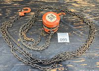 Overall view of hoist body, chain and hooks