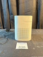 Front view of Morento air purifier and power cord