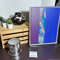 Group shot: framed artwork, Partylite tealight holder, ceramic bowl, three succulents