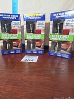 Front view of three boxed door knob sets