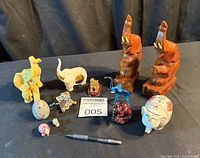 Full group shot showing all 11 elephant items