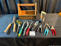 Overall view of tote and all gardening tools