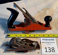 Bench plane and block plane side by side with ruler for scale