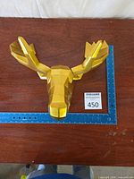 Front view showing overall shape and ruler for scale