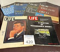 Six magazines laid out showing covers