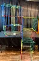 Full view of assembled multicolour wire cube shelving unit