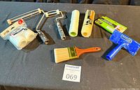 Group shot of all painting tools and consumables on tabletop