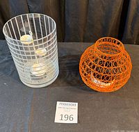 Both candle holders side by side for scale and comparison