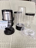 Motor base, two cups, lids, gasket overview