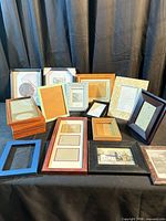 Group shot of assorted frames on table