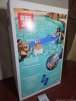 Front of sealed retail box showing product image and branding