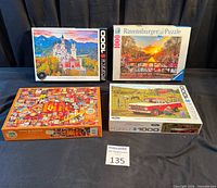 Group shot of all four boxed puzzles