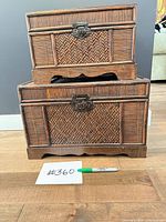 Front view of both stacked chests with scale reference