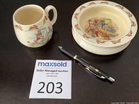 Mug and bowl front view showing pattern