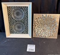 Both wall art pieces side by side for scale and comparison