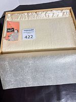 Blanket in original box with rice paper wrap and label visible