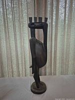 Full view of wooden sculpture front