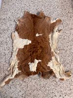 Full view of cowhide rug
