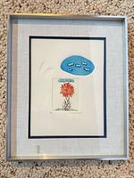 Full view of framed etching print in silver metal frame