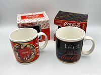 Both mugs front view with boxes