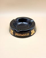 Side view showing Burtonwood lettering and top hat graphic