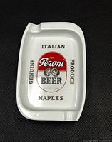 Front view showing Peroni Beer logo and text on ashtray