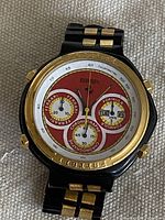 Front view showing dial, bezel, bracelet