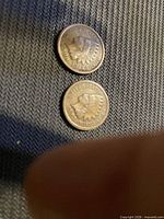Two Indian Head cents obverse sides, dates visible