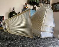 All four shades showing flared ribbed design and clear collars