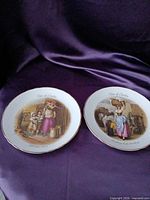 Two Cries of London plates side by side showing full design and size