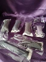 All six sealed catnip toys displayed on purple background