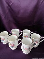 Six bone china cups front view