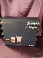 DeLonghi Fancy Collection retail box front showing product name and brand