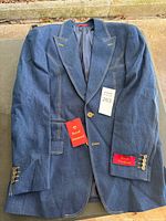 Front view of blue denim Royal Diamond blazer with tags attached
