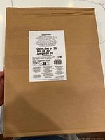 Front of sealed box showing product label indicating contents: set of 30 hangers