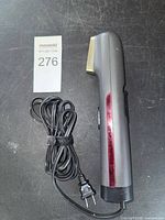 Steamer full view with cord coiled