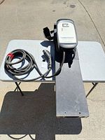 Entire charger assembly, cable, connector and mounting bracket