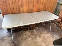 Top view of full table unfolded showing surface and centre seam