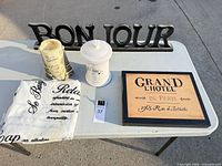 Group shot showing all five French-themed bathroom items on table