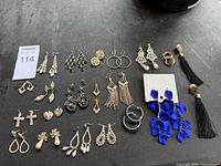 All earrings laid out showing quantity and variety