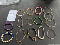 All fourteen bracelets laid out