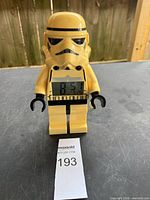 Front view of LEGO Stormtrooper alarm clock showing LCD display