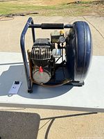 Left side view: pump, motor, tank, roll-cage frame