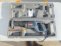 Ryobi corded reciprocating saw in molded carry case with blade attached
