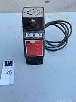 Full view of sharpener with cord