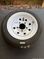 Overall view of Goodride ST6000 tire mounted on white steel rim