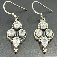 front view of both earrings showing design and stones