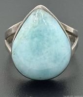 front view showing teardrop larimar stone and bezel setting