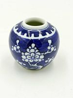 Front view of small blue and white porcelain ginger jar