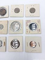 Top-down view of nine coin flips